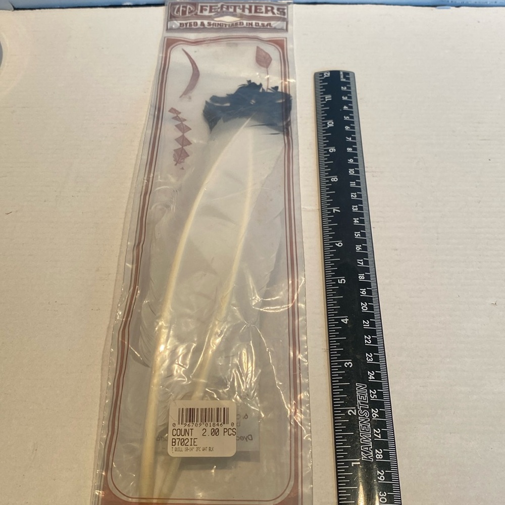 NIP Three packages of natural feathers